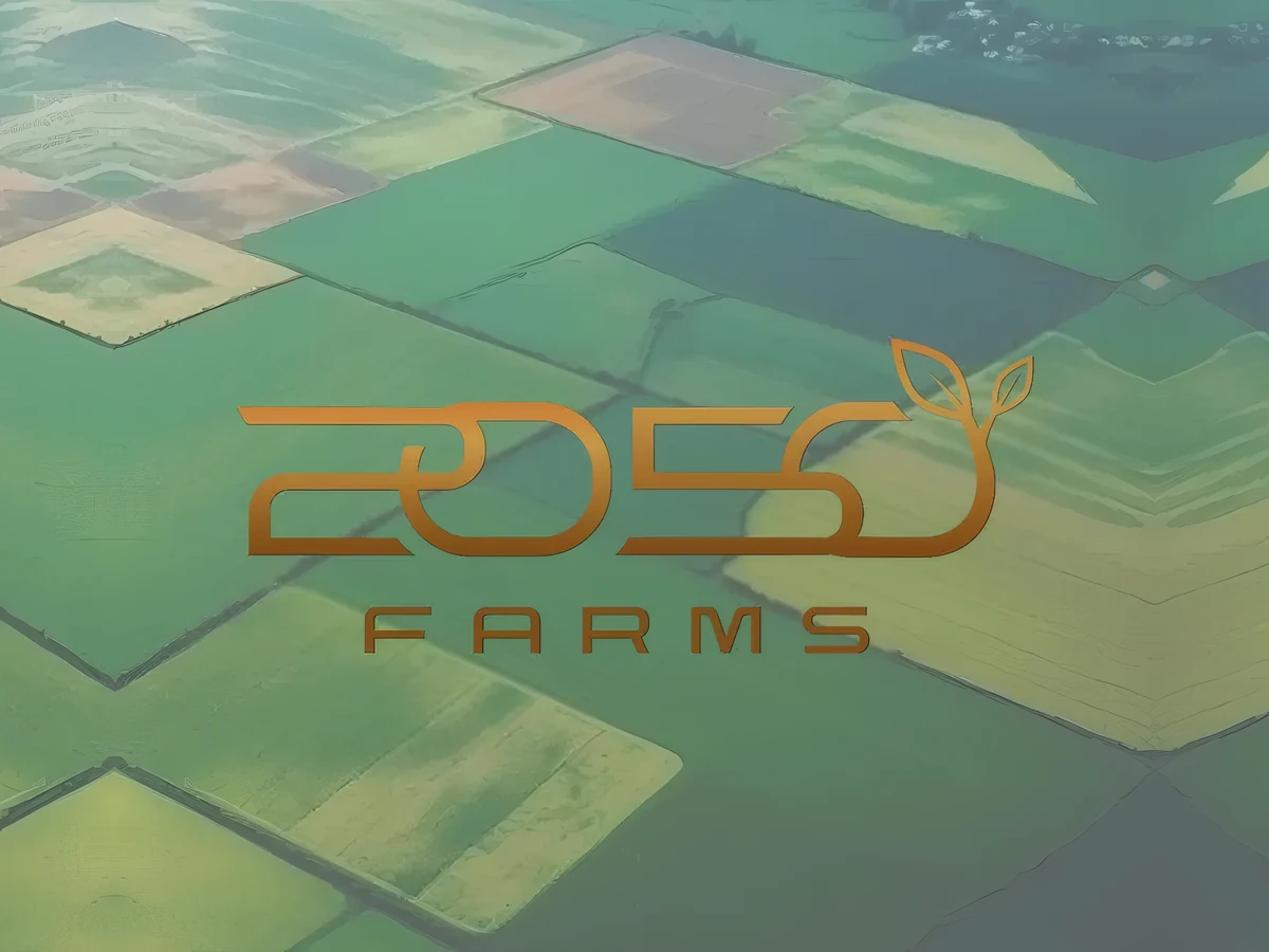 The 2050 Farms mark over an aerial view of patchwork farmland